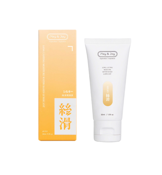 Lubricante Silky Water de 100 ml junto a su caja, fórmula base agua compatible con preservativos y juguetes.